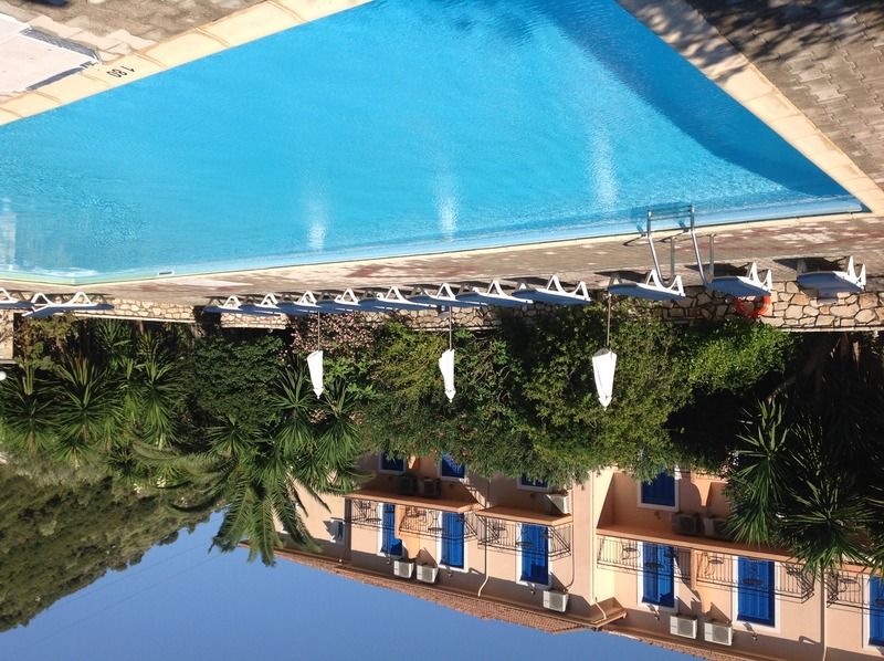 Hotel Nostos Frikes Bagian luar foto