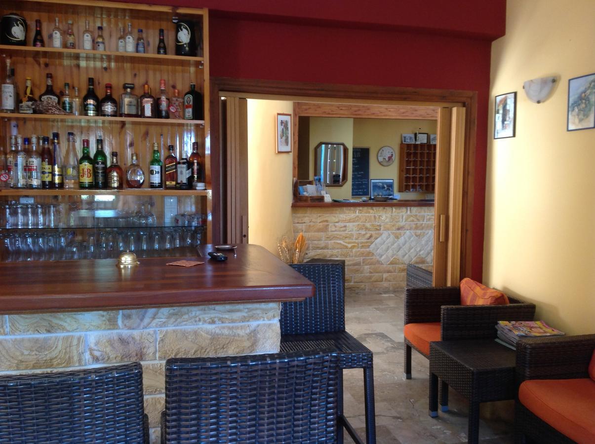Hotel Nostos Frikes Bagian luar foto