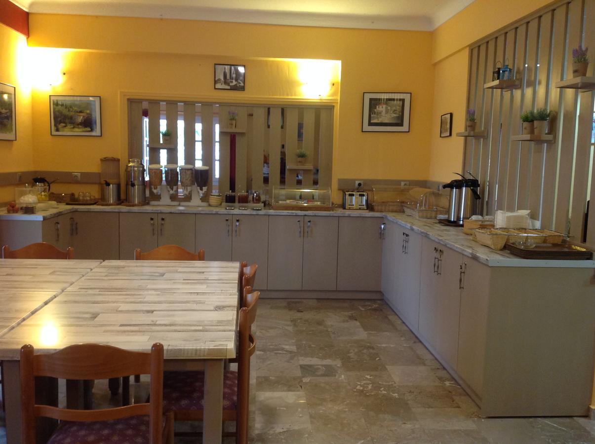 Hotel Nostos Frikes Bagian luar foto