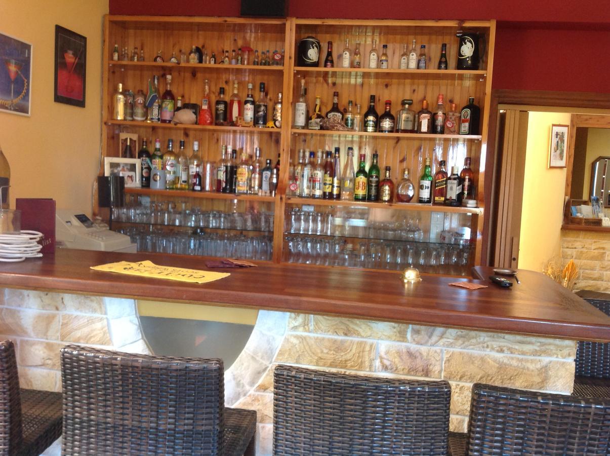 Hotel Nostos Frikes Bagian luar foto