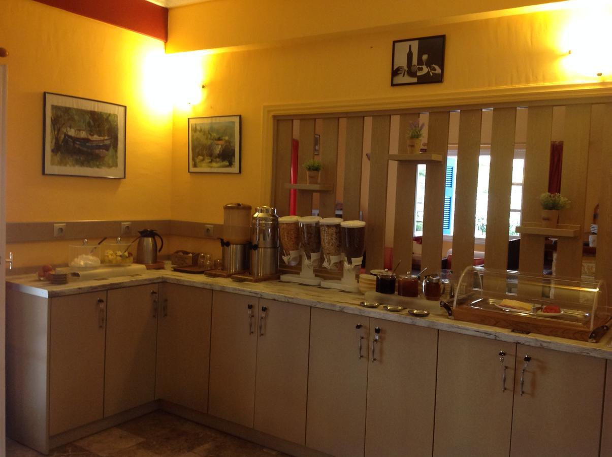 Hotel Nostos Frikes Bagian luar foto